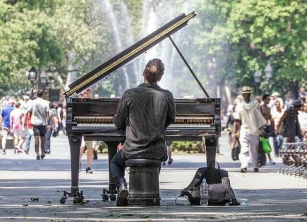 Pianist playing outside